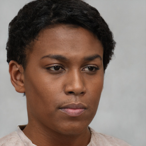 Neutral black young-adult female with short  brown hair and brown eyes