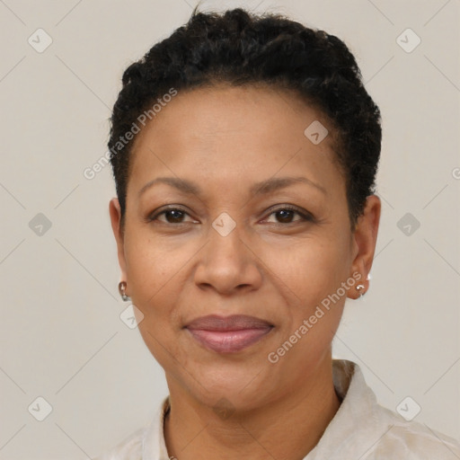 Joyful black adult female with short  brown hair and brown eyes