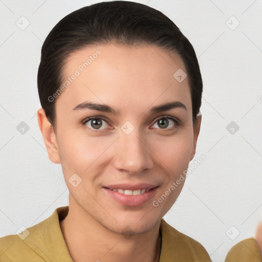 Joyful white young-adult female with short  brown hair and brown eyes