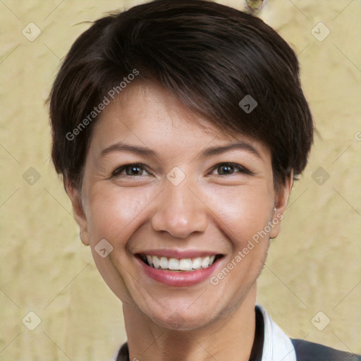 Joyful white adult female with short  brown hair and brown eyes