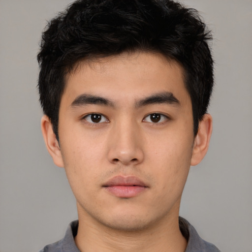 Neutral asian young-adult male with short  black hair and brown eyes