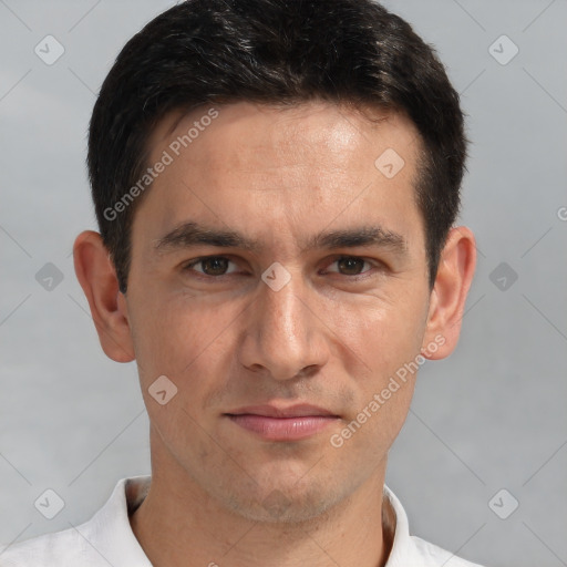 Joyful white adult male with short  brown hair and brown eyes