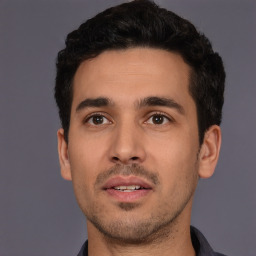 Neutral white young-adult male with short  black hair and brown eyes