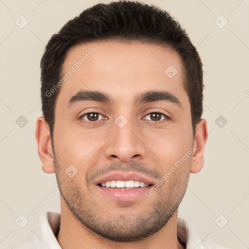 Joyful white young-adult male with short  brown hair and brown eyes