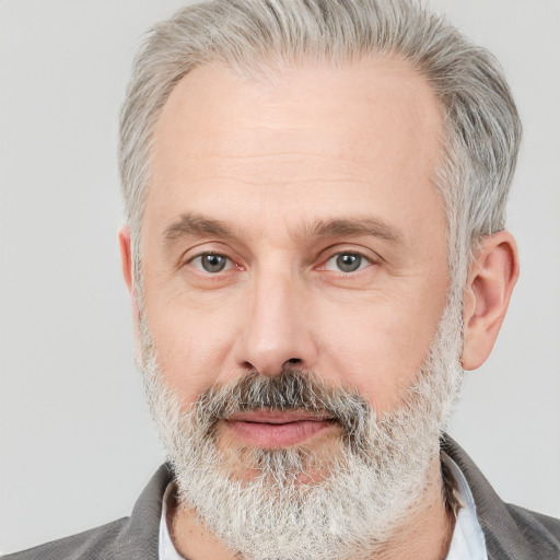 Neutral white middle-aged male with short  gray hair and grey eyes