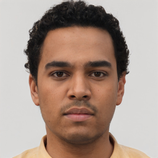 Neutral latino young-adult male with short  brown hair and brown eyes