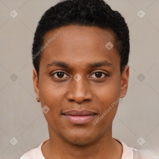 Joyful black young-adult male with short  black hair and brown eyes