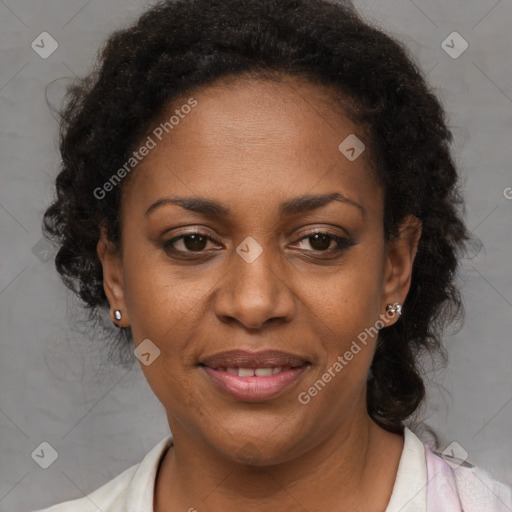 Joyful black adult female with medium  brown hair and brown eyes