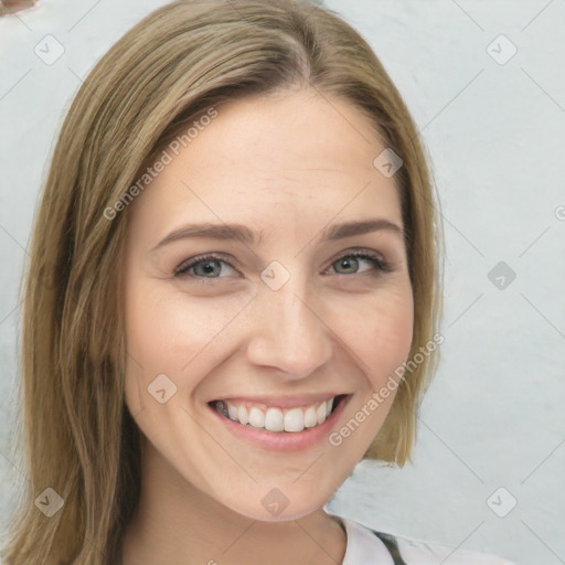 Joyful white young-adult female with medium  brown hair and blue eyes