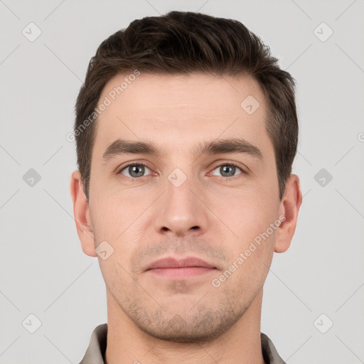 Neutral white young-adult male with short  brown hair and brown eyes