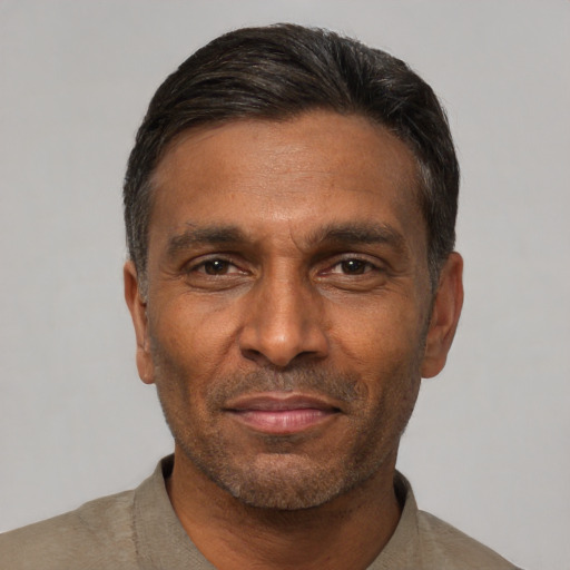 Neutral black adult male with short  black hair and brown eyes