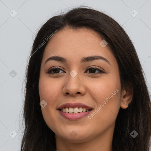 Joyful asian young-adult female with long  brown hair and brown eyes