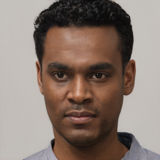 Neutral black young-adult male with short  black hair and brown eyes