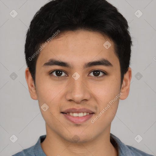 Joyful latino young-adult male with short  black hair and brown eyes