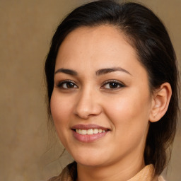 Joyful white young-adult female with medium  brown hair and brown eyes