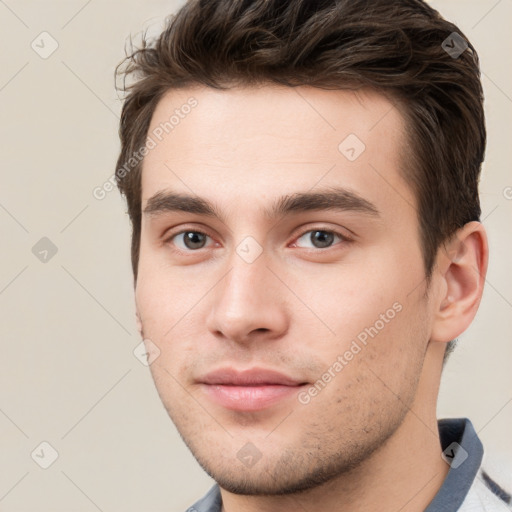 Neutral white young-adult male with short  brown hair and brown eyes