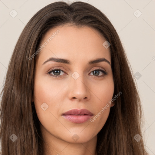 Neutral white young-adult female with long  brown hair and brown eyes