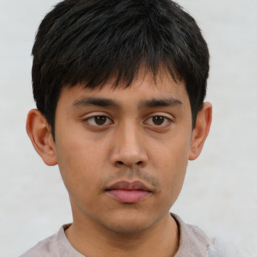 Neutral asian young-adult male with short  brown hair and brown eyes