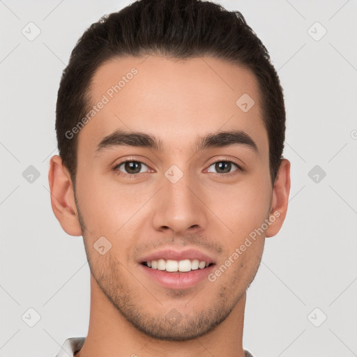 Joyful white young-adult male with short  brown hair and brown eyes