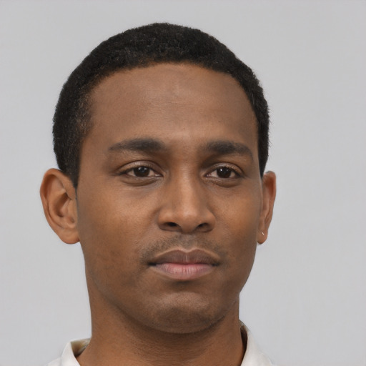 Neutral black young-adult male with short  black hair and brown eyes