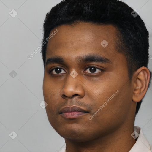 Neutral black young-adult male with short  black hair and brown eyes
