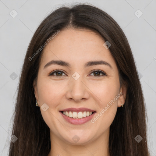 Joyful white young-adult female with long  brown hair and brown eyes