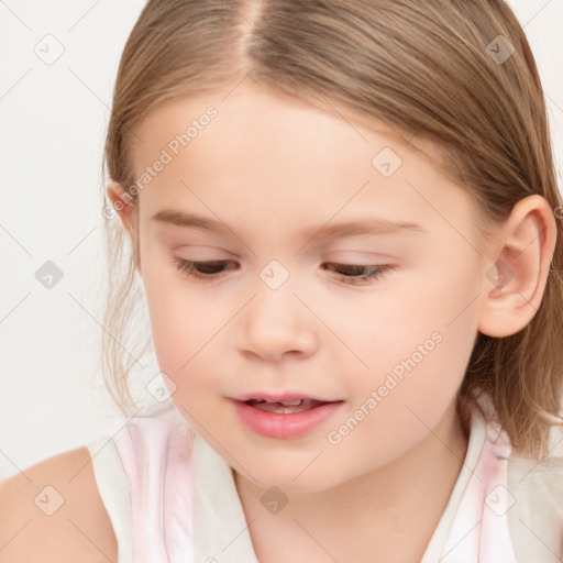 Joyful white child female with medium  brown hair and brown eyes