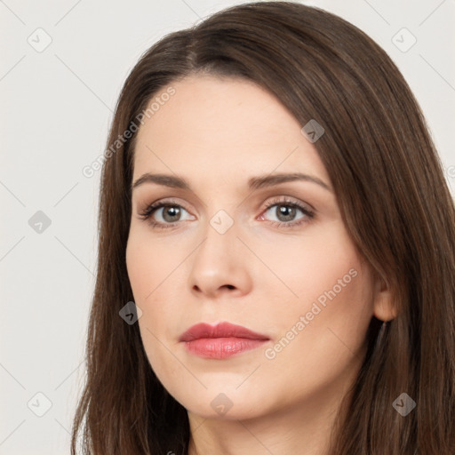 Neutral white young-adult female with long  brown hair and brown eyes