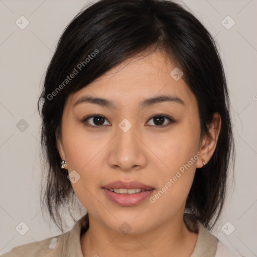 Joyful asian young-adult female with medium  brown hair and brown eyes