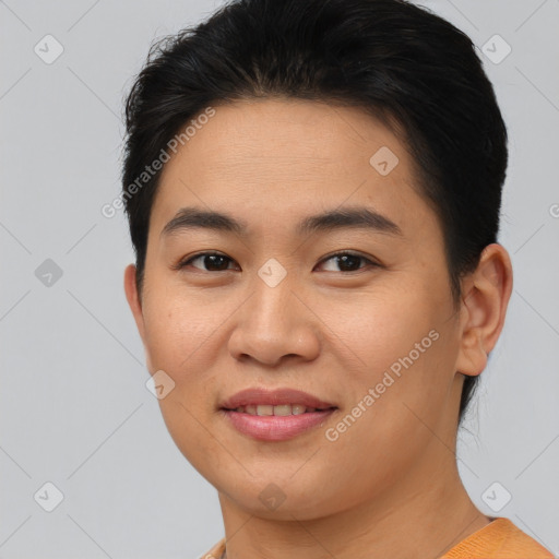 Joyful asian young-adult female with short  brown hair and brown eyes
