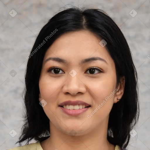 Joyful asian young-adult female with medium  black hair and brown eyes