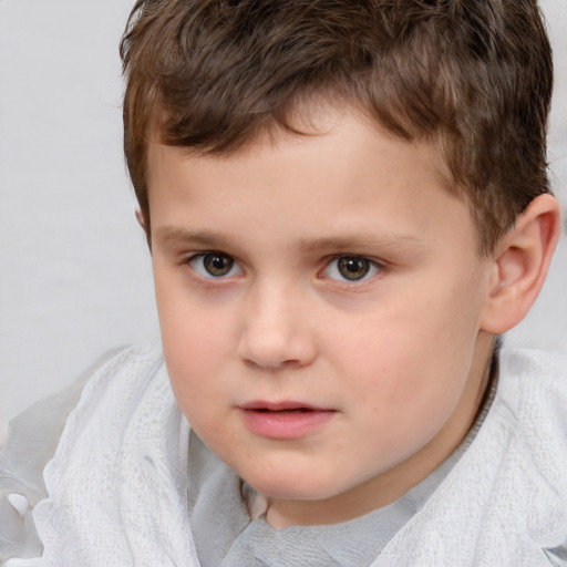 Neutral white child male with short  brown hair and brown eyes