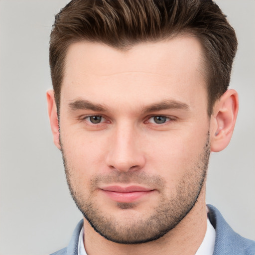 Neutral white young-adult male with short  brown hair and brown eyes