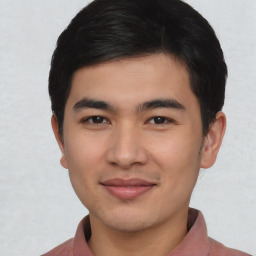 Joyful asian young-adult male with short  black hair and brown eyes