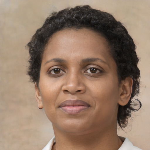Neutral black young-adult female with short  brown hair and brown eyes