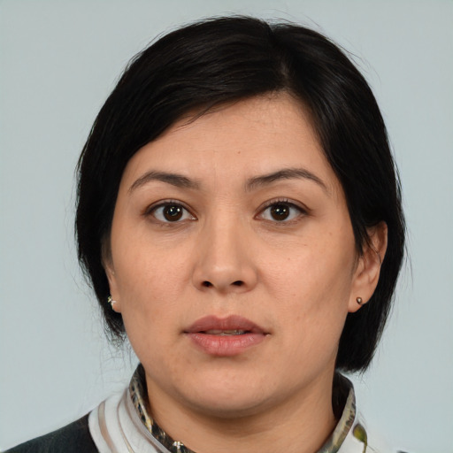 Neutral white young-adult female with medium  black hair and brown eyes