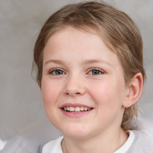 Joyful white child female with medium  brown hair and blue eyes