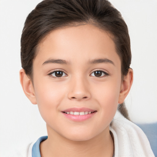 Joyful white child female with short  brown hair and brown eyes