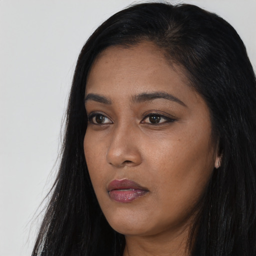 Neutral asian young-adult female with long  black hair and brown eyes