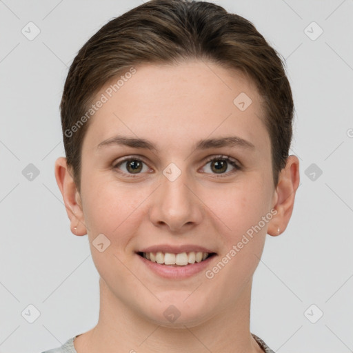 Joyful white young-adult female with short  brown hair and grey eyes