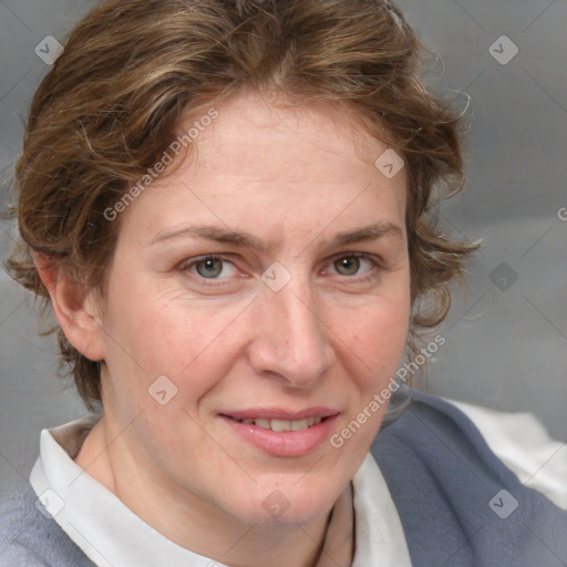 Joyful white adult female with medium  brown hair and blue eyes