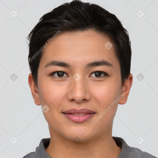 Joyful asian young-adult female with short  brown hair and brown eyes