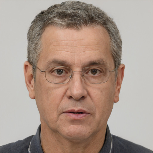 Neutral white middle-aged male with short  brown hair and brown eyes