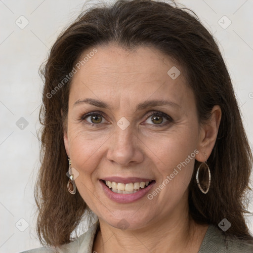 Joyful white adult female with medium  brown hair and brown eyes