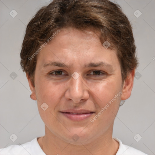 Joyful white adult female with short  brown hair and brown eyes