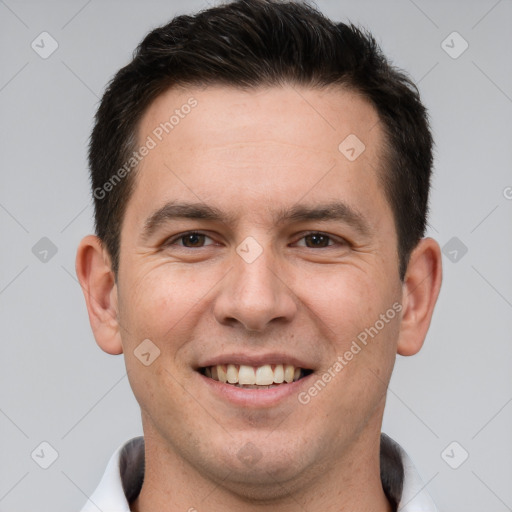 Joyful white young-adult male with short  brown hair and brown eyes