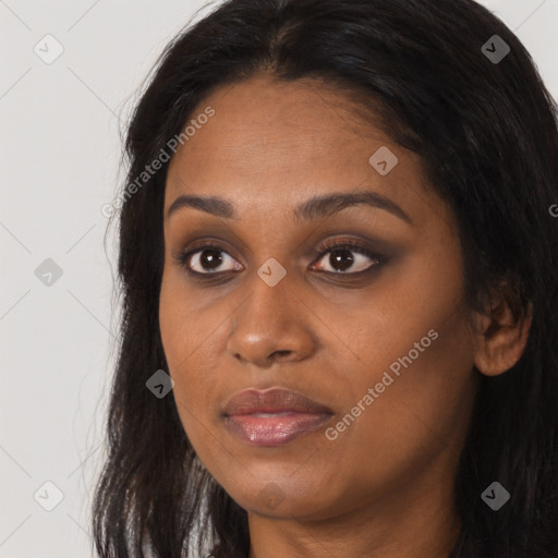 Joyful asian young-adult female with long  brown hair and brown eyes