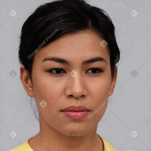 Joyful asian young-adult female with short  brown hair and brown eyes