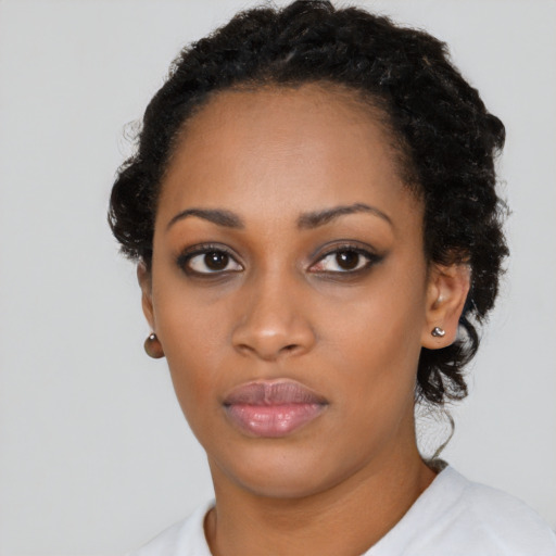 Neutral black young-adult female with short  black hair and brown eyes