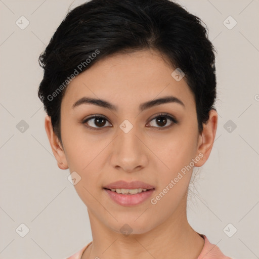 Joyful latino young-adult female with short  black hair and brown eyes